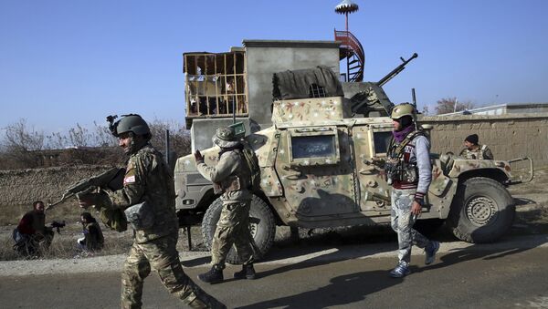Forças de segurança se posicionam na região da base aérea de Bragram, na província de Cabul, no Afeganistão, em 11 de dezembro de 2019 (foto de arquivo) - Sputnik Brasil