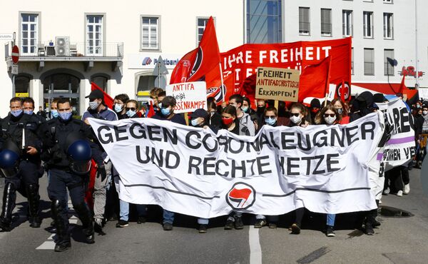 COVID-19: protestos contra restrições sociais entram no 2º dia consecutivo na Alemanha - Sputnik Brasil