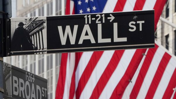 The Wall Street sign is pictured at the New York Stock exchange (NYSE) in the Manhattan borough of New York City, New York, U.S., March 9, 2020 - Sputnik Brasil