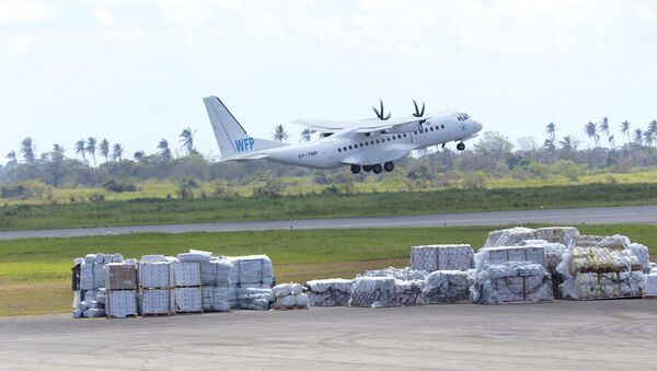 Avião do Programa Mundial de Alimentos decola do aeroporto internacional de Beira, Moçambique, 13 de março de 2019 - Sputnik Brasil