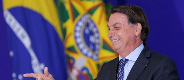 O presidente Jair Bolsonaro durante cerimônia no Palácio do Planalto. - Sputnik Brasil