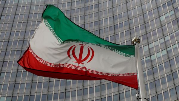 Bandeira do Irã em frente da sede da Agência Internacional de Energia Atômica (AIEA) em Viena, Áustria, 9 de setembro de 2019 - Sputnik Brasil