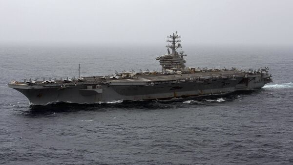 Porta-aviões USS Nimitz navega no mar Arábico, foto divulgada em 7 de setembro de 2020 - Sputnik Brasil