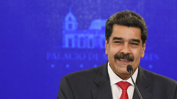 Presidente da Venezuela, Nicolás Maduro, sorrindo durante coletiva de imprensa - Sputnik Brasil