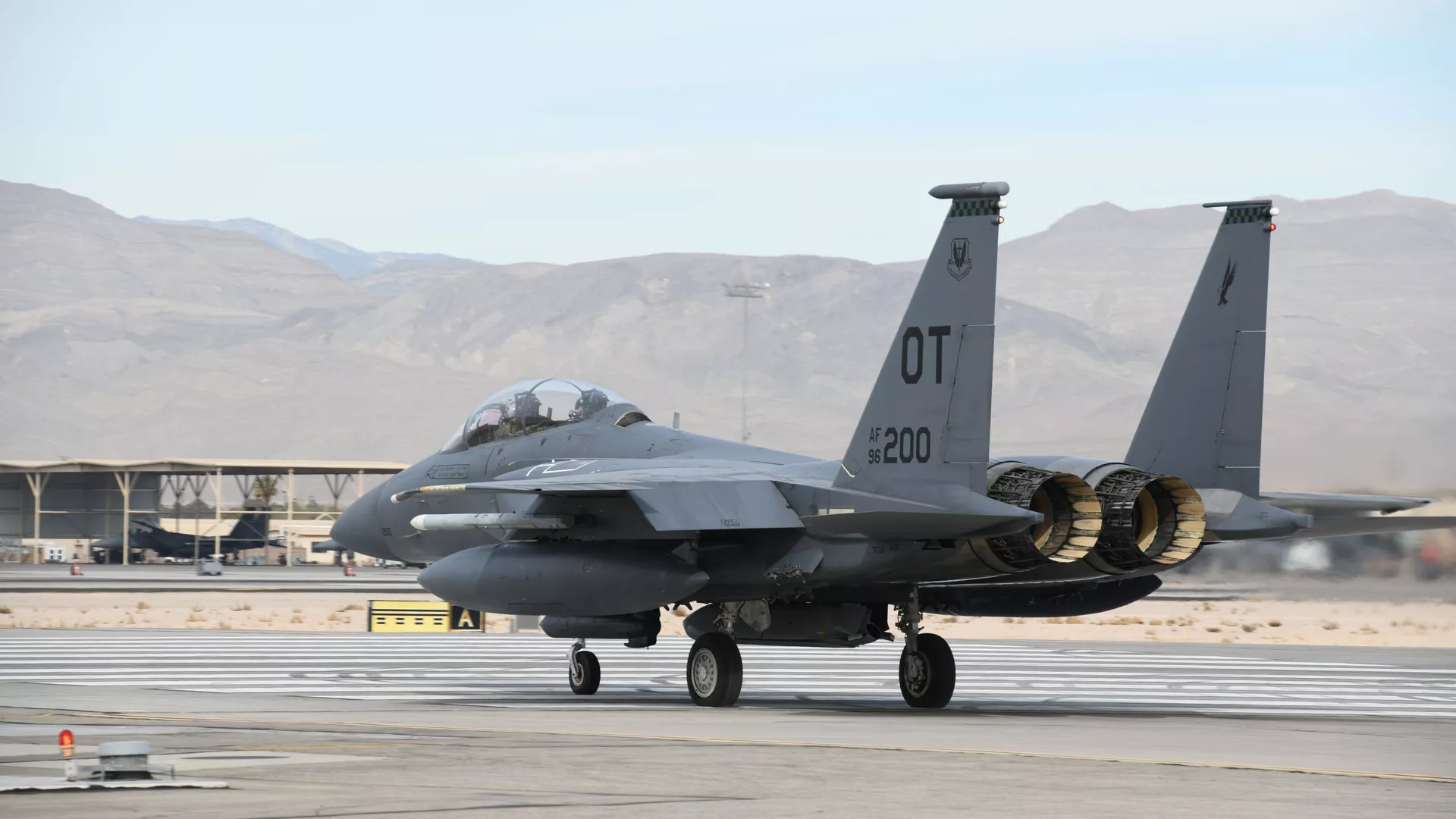 Caça F-15E prepara-se para usar míssil AGM-158B em base aérea no Novo México, EUA, 7 de janeiro de 2021 - Sputnik Brasil, 1920, 30.05.2026