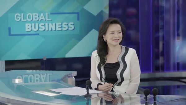 Jornalista australiana Cheng Lei em estúdio de televisão em Pequim, China - Sputnik Brasil