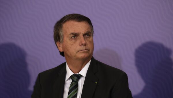 Presidente Jair Bolsonaro participa de cerimônia no Palácio do Planalto - Sputnik Brasil