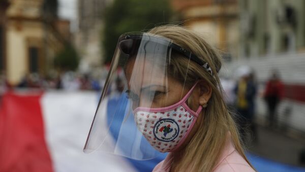 Enfermeira participa de protesto por melhores salário em meio à pandemia do coronavírus em Assunção, no Paraguai - Sputnik Brasil