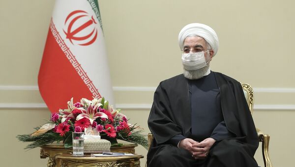 O presidente do Irã, Hassan Rouhani, recebe o ministro das Relações Exteriores da Irlanda, Simon Coveney, em Teerã, em 7 de março de 2021 - Sputnik Brasil