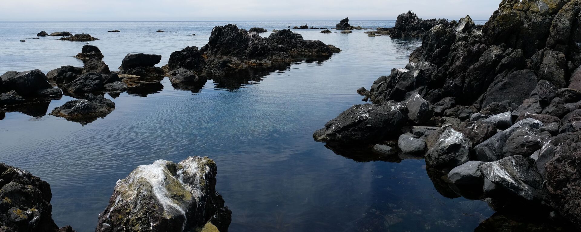 Ilha Rishiri, ilha vulcânica no mar do Japão, na ponta noroeste de Hokkaido. - Sputnik Brasil, 1920, 23.04.2022