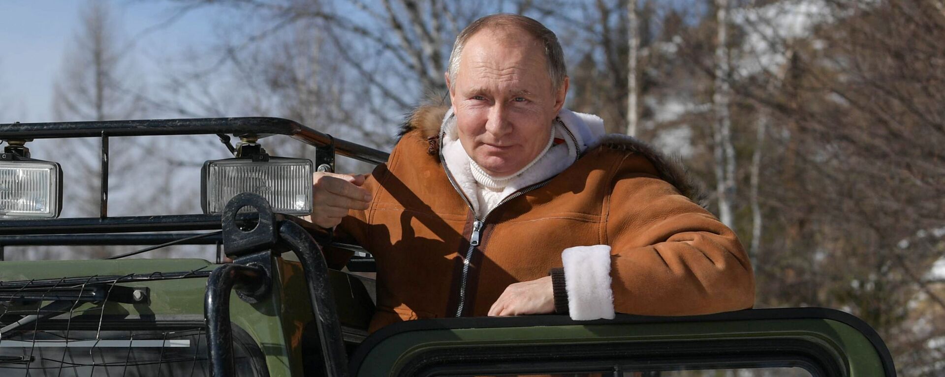 O presidente russo, Vladimir Putin, em momento de lazer no Distrito Federal da Sibéria, na Rússia, em 21 de março de 2021 (foto de arquivo) - Sputnik Brasil, 1920, 27.09.2022