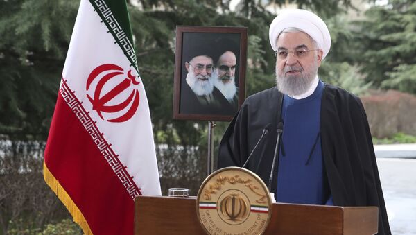 Hassan Rouhani, presidente do Irã, profere mensagem de Ano Novo iraniano, ou Nowruz, em Teerã, Irã, 20 de março de 2021 - Sputnik Brasil