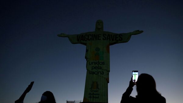 Grupo Unidos pela Vacina faz ação no Cristo Redentor, no Rio de Janeiro - Sputnik Brasil
