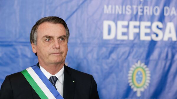 O presidente Jair Bolsonaro,  participa da cerimônia comemorativa aos 20 anos de criação do Ministério da Defesa e imposição da Ordem do Mérito da Defesa, 10 de junho de 2019 - Sputnik Brasil