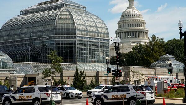 U.S. Capitol Police vehicles and other emergency vehicles respond as police investigated reports of a suspicious vehicle near the U.S. Capitol in Washington, U.S., August 19, 2021. - Sputnik Brasil