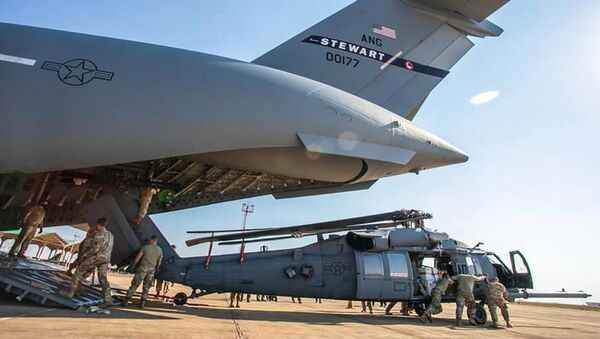 Duas aeronaves C-17 Globemaster pousaram na Base Aérea de Campo Grande transportando militares e dois helicópteros Sikorsky MH-60 Pave Hawk, 21 de agosto de 2021 - Sputnik Brasil