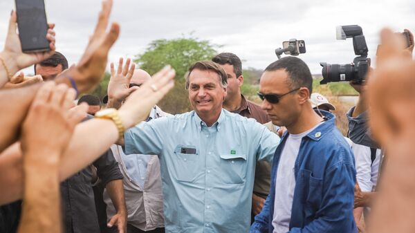 Presidente Jair Bolsonaro assinou o contrato de concessão da Ferrovia de Integração Oeste-Leste, no interior da Bahia, em Tanhaçu, hoje, 3 de agosto de 2021 - Sputnik Brasil