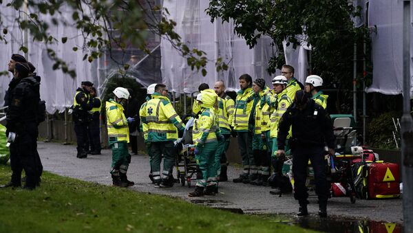 Equipes de resgate trabalham em prédio residencial atingido por explosão na Suécia, em 28 de setembro de 2021 - Sputnik Brasil