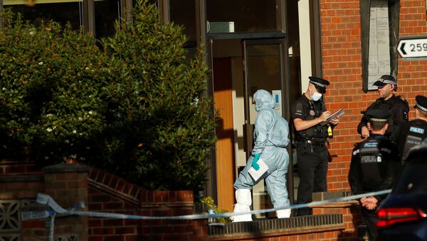 A member of the scientific police enters the scene where MP David Amess was stabbed during constituency surgery, in Leigh-on-Sea, Britain October 15, 2021. - Sputnik Brasil