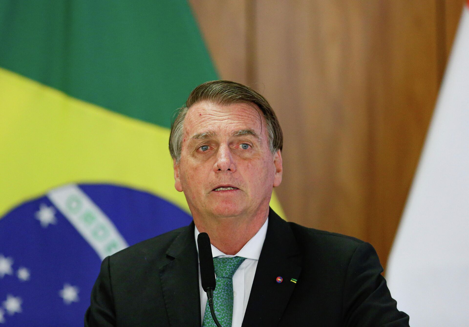 O presidente do Brasil, Jair Bolsonaro, fala durante uma coletiva de imprensa no Palácio do Planalto, em Brasília, no dia 24 de novembro de 2021 - Sputnik Brasil, 1920, 16.12.2021