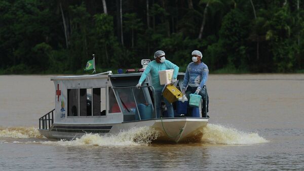 Agentes da Saúde do SUS viajam de barco para a comunidade Santa Rosa, no estado do Amazonas, para vacinar as comunidades ribeirinhas. Sem o Sistema Único de Saúde a campanha de vacinação no Brasil teria sido muito mais difícil, 12 de fevereiro de 2021 - Sputnik Brasil