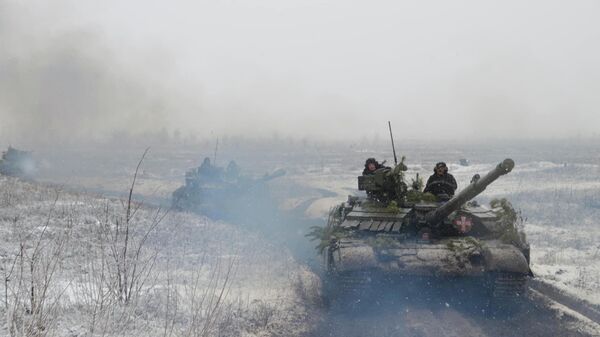 Efetivos das Forças Armadas ucranianas durante exercícios militares na região de Kharkov, Ucrânia, foto publicada em 20 de dezembro de 2021 - Sputnik Brasil