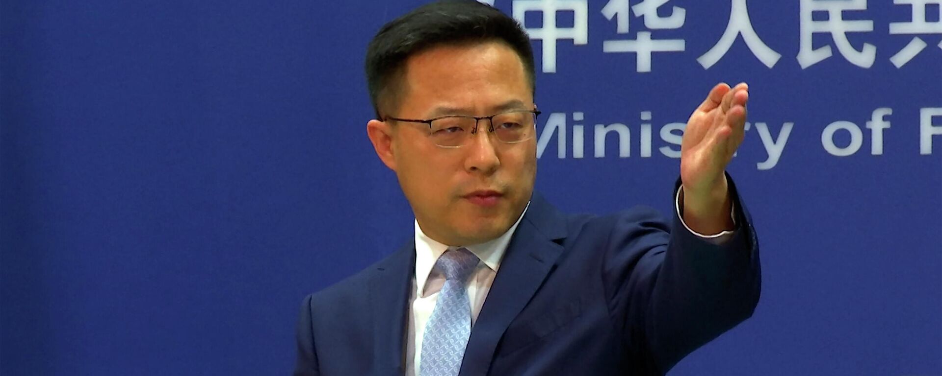 Zhao Lijian, porta-voz do Ministério das Relações Exteriores chinês, durante coletiva de imprensa em Pequim, China, 19 de janeiro de 2022 - Sputnik Brasil, 1920, 30.05.2022