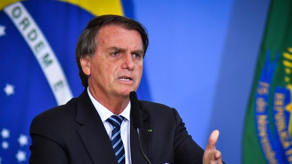 O presidente Jair Bolsonaro, em cerimônia no Palácio do Planalto, em 12 de janeiro de 2022 - Sputnik Brasil