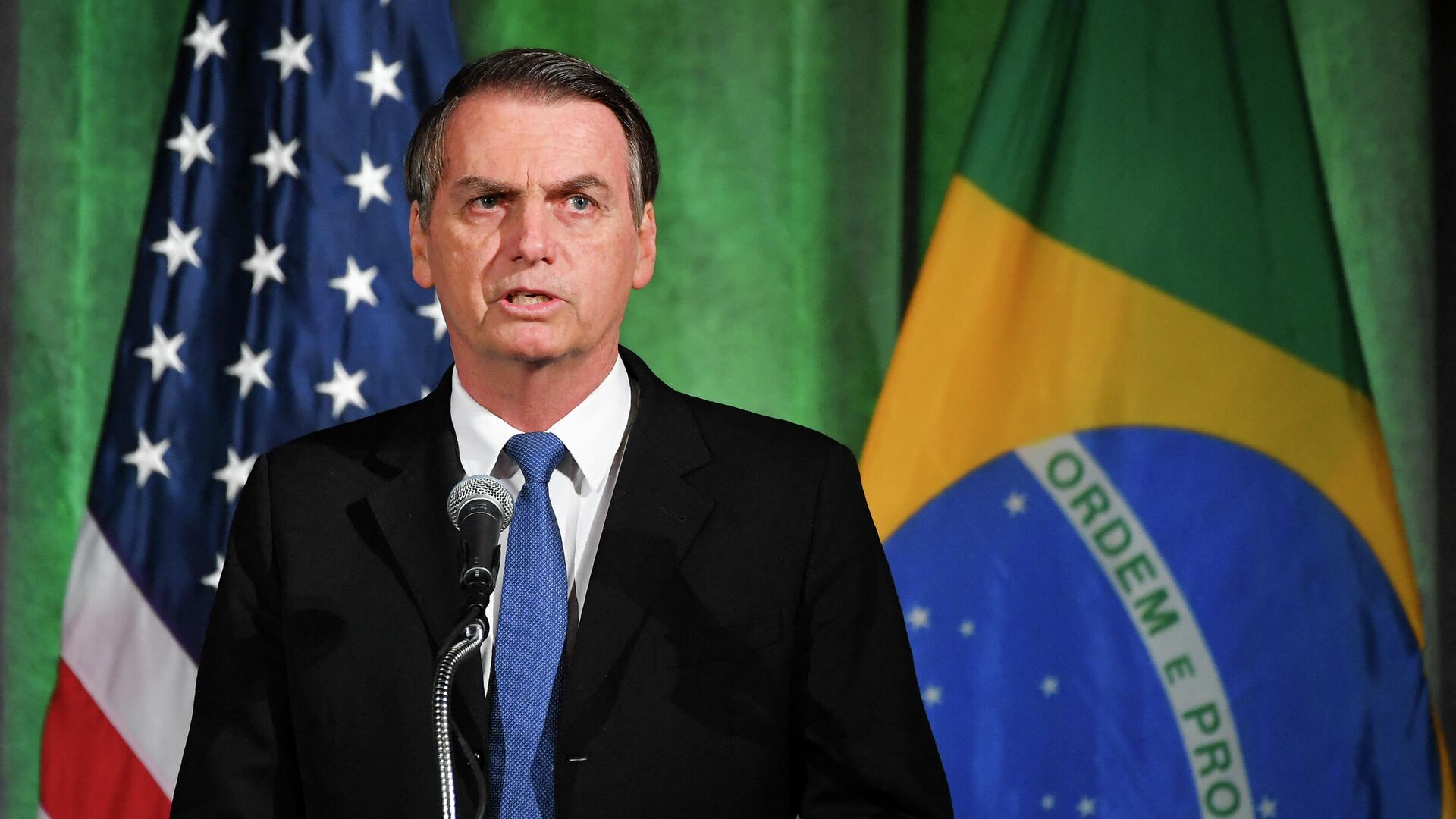 Presidente do Brasil, Jair Bolsonaro, discursa durante uma discussão sobre relações EUA-Brasil na Câmara do Comércio americana em Washington, 18 de março de 2019 - Sputnik Brasil, 1920, 02.02.2022