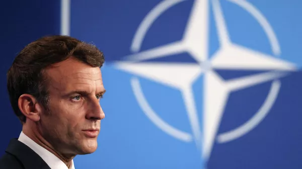 Em Bruxelas, na Bélgica, o presidente francês, Emmanuel Macron, participa de coletiva de imprensa durante encontro da Organização do Tratado do Atlântico Norte (OTAN), em 14 de junho de 2021 Em Bruxelas, na Bélgica, o presidente francês, Emmanuel Macron, participa de coletiva de imprensa durante encontro da Organização do Tratado do Atlântico Norte (OTAN), em 14 de junho de 2021 - Sputnik Brasil