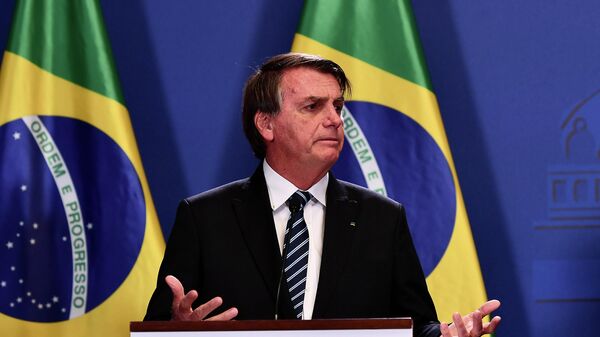 O presidente brasileiro Jair Bolsonaro durante declaração conjunta à imprensa, com o primeiro-ministro húngaro Viktor Orban, em Budapeste, na Hungria, em 17 de fevereiro de 2022 - Sputnik Brasil