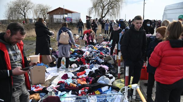 Refugiados ucranianos no posto de fronteira de Medyka–Shegini, na Polônia, em 26 de fevereiro de 2022 (foto de arquivo) - Sputnik Brasil