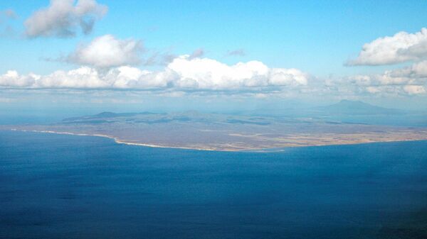 Vista área da ilha Kunashiri, pertencente às Ilhas Curilas, pertencentes à Rússia (imagem referencial) - Sputnik Brasil