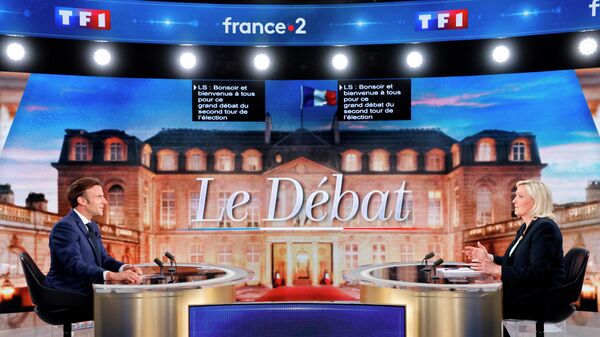 Emmanuel Macron debate com Marine Le Pen em 20 de abril de 2022.  - Sputnik Brasil