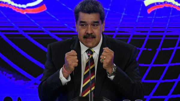 Nicolás Maduro, presidente venezuelano, fala durante assinatura de acordo com a Rússia no Palácio Miraflores presidencial em Caracas, Venezuela, 16 de fevereiro de 2022 - Sputnik Brasil