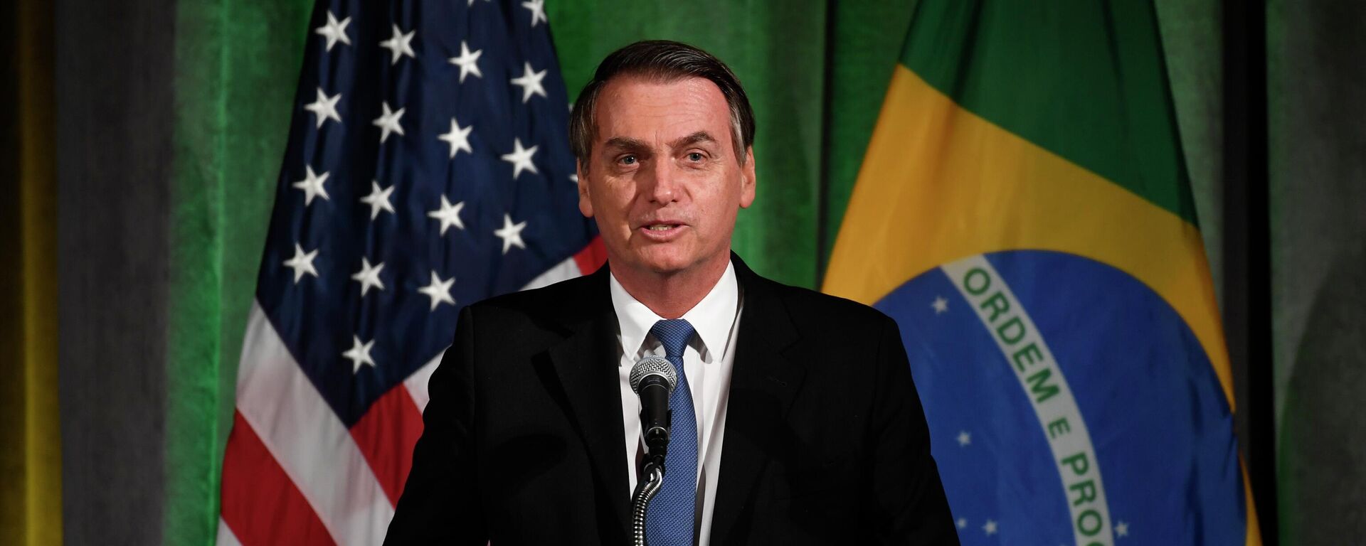 O presidente brasileiro, Jair Bolsonaro, discursa durante evento da Câmara de Comércio Brasil–Estados Unidos, em Washington, 18 de março de 2019 - Sputnik Brasil, 1920, 01.06.2022