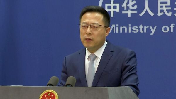 Zhao Lijian, porta-voz do Ministério das Relações Exteriores chinês, fala durante briefing de imprensa em 10 de março de 2022, Pequim, China - Sputnik Brasil