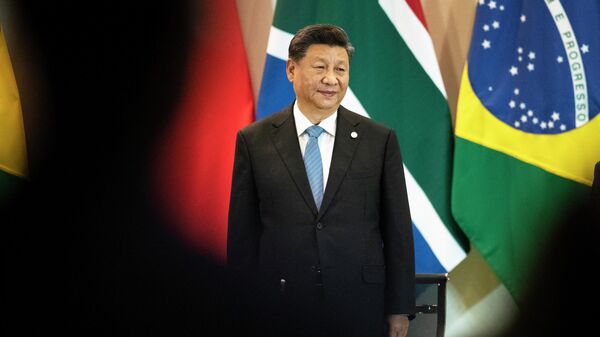 O presidente da China, Xi Jinping, chega a uma reunião com membros do Conselho Empresarial e gestão do Novo Banco de Desenvolvimento durante a Cúpula do BRICS em Brasília, 14 de novembro de 2019 - Sputnik Brasil