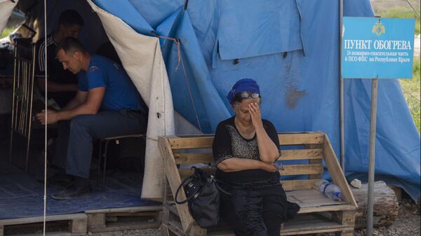Pessoas em um centro de acomodação temporária para refugiados da Ucrânia em 31 de maio de 2022 - Sputnik Brasil
