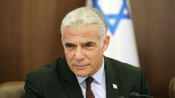 Yair Lapid, primeiro-ministro de Israel, participa de primeira reunião de gabinete em Jerusalém, 3 de julho de 2022 - Sputnik Brasil