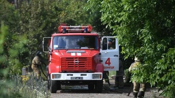 Equipes de emergência se dirigem ao local de incêndio no distrito de Budennovsky, na República Popular de Donetsk (RPD), em 26 de julho de 2022 (foto de arquivo) - Sputnik Brasil
