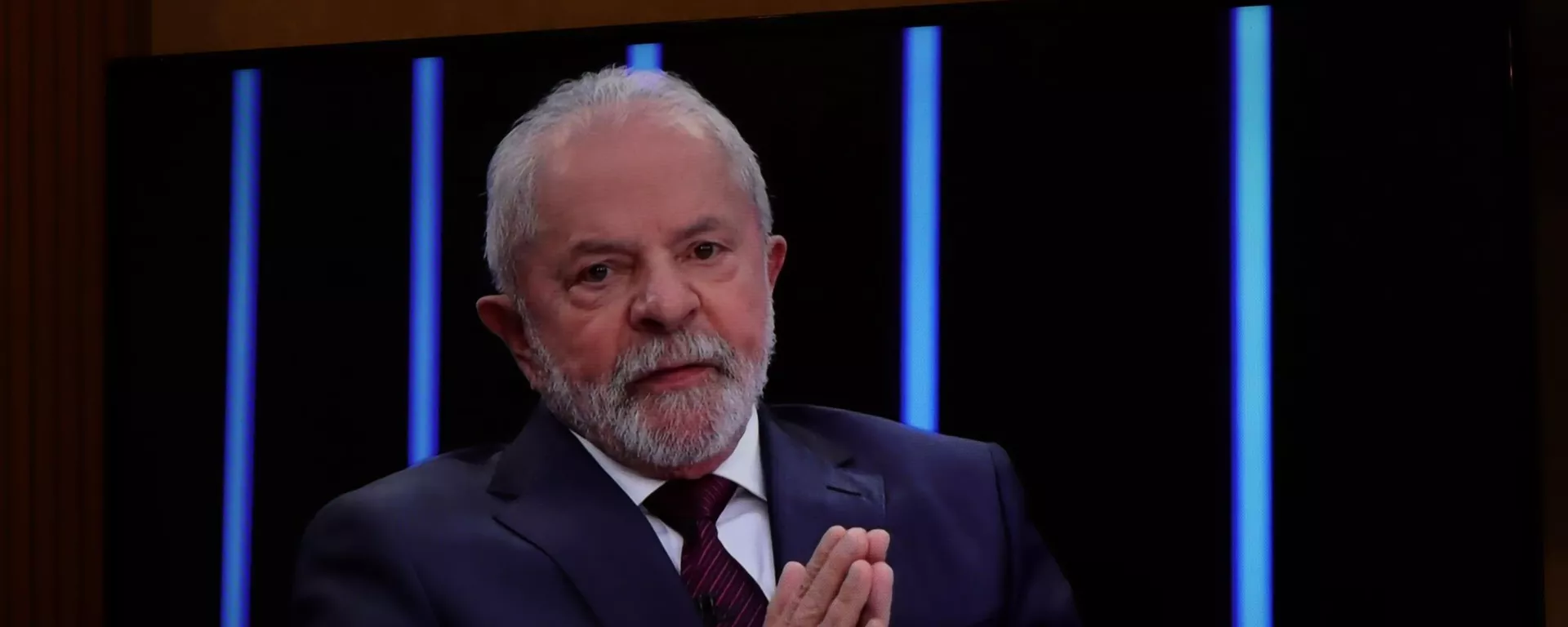 Em Curitiba, Paraná, uma televisão exibe entrevista do candidato e ex-presidente Luiz Inácio Lula da Silva (PT) ao Jornal Nacional, da TV Globo, em 25 de agosto de 2022 - Sputnik Brasil, 1920, 25.08.2022