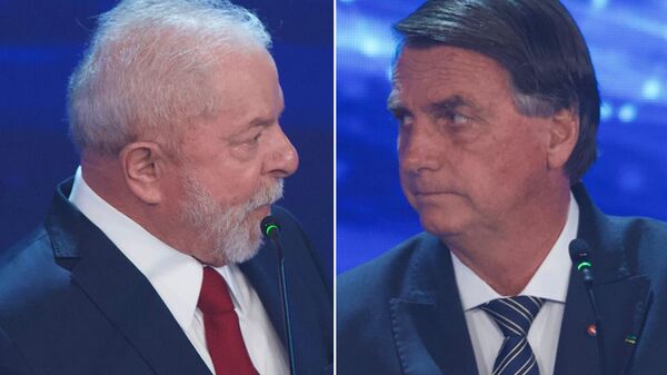 Lula (PT) e Jair Bolsonaro (PL) durante o primeiro debate dos candidatos à presidência, em 28 de agosto de 2022 (foto de arquivo). - Sputnik Brasil
