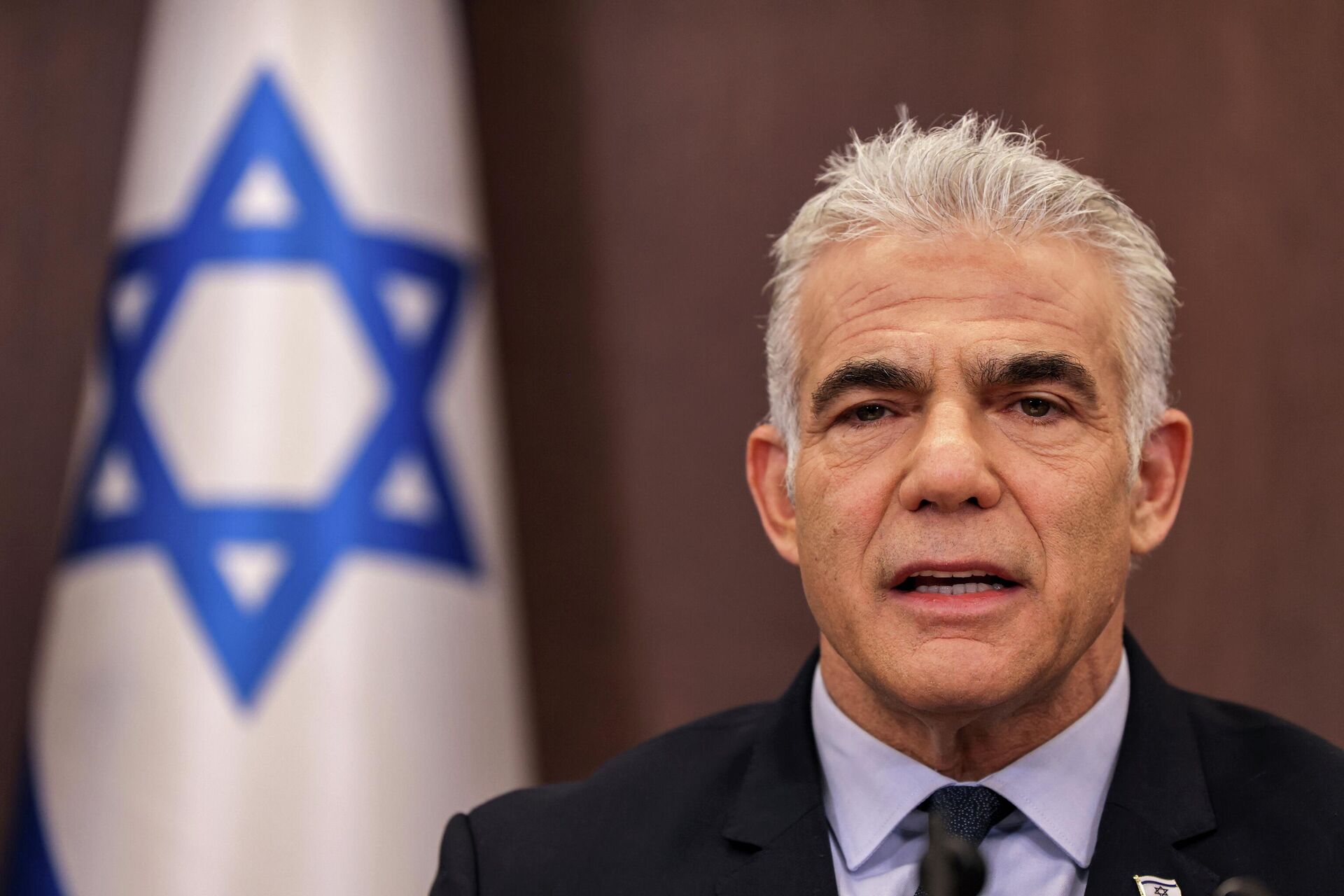 
O primeiro-ministro interino de Israel, Yair Lapid, participa da reunião semanal do gabinete em Jerusalém, 18 de setembro de 2022 - Sputnik Brasil, 1920, 19.10.2022