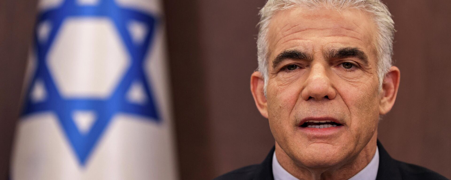 
O primeiro-ministro interino de Israel, Yair Lapid, participa da reunião semanal do gabinete em Jerusalém, 18 de setembro de 2022 - Sputnik Brasil, 1920, 18.10.2022