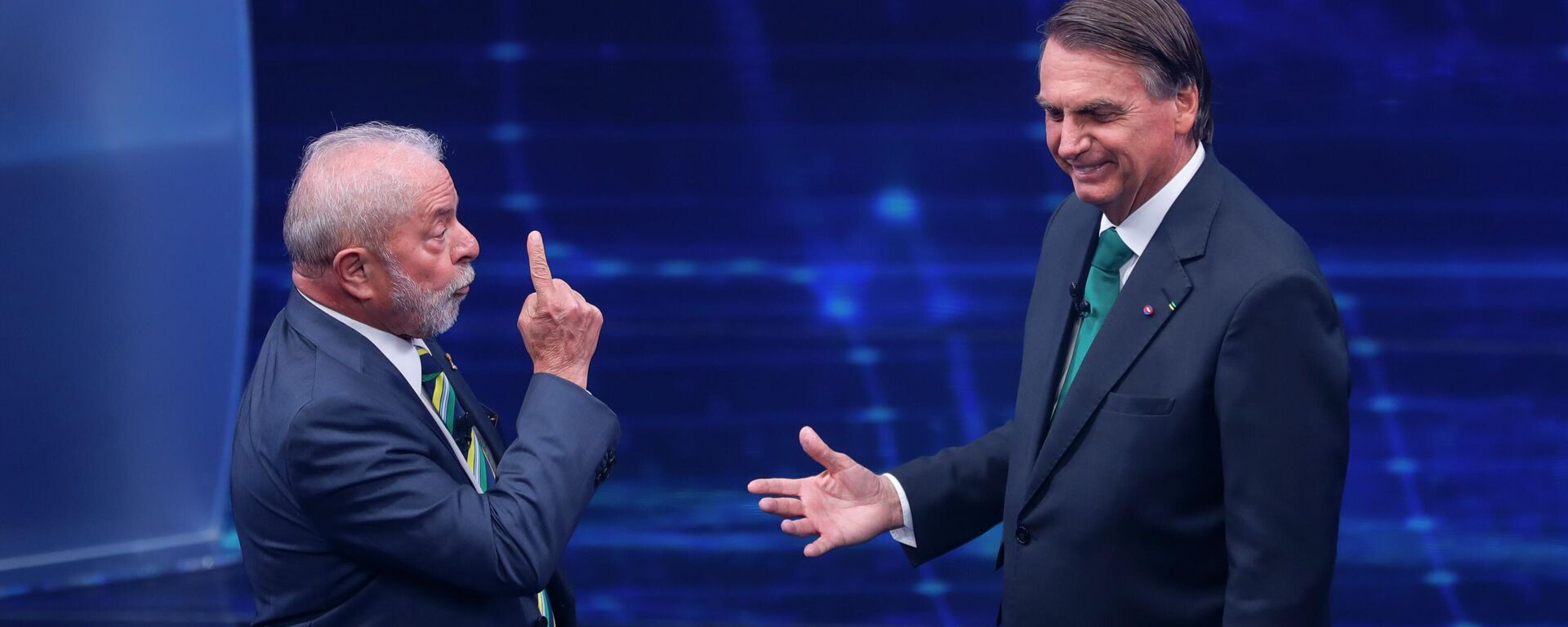 Lula e Bolsonaro travam embate durante o debate do 2º turno das eleições presidenciais em 16 de outubro de 2022 - Sputnik Brasil, 1920, 20.10.2022