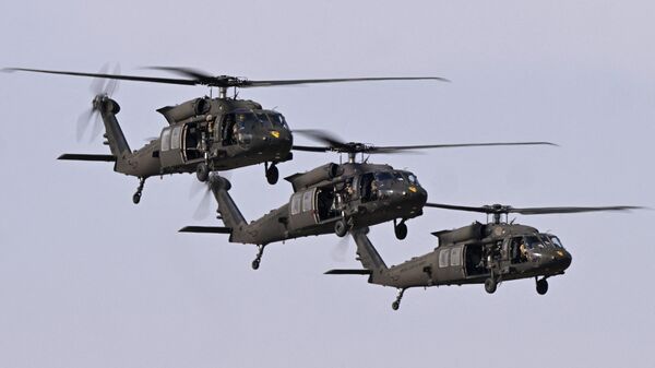 Três helicópteros UH-60 Black Hawk (imagem de referência) - Sputnik Brasil