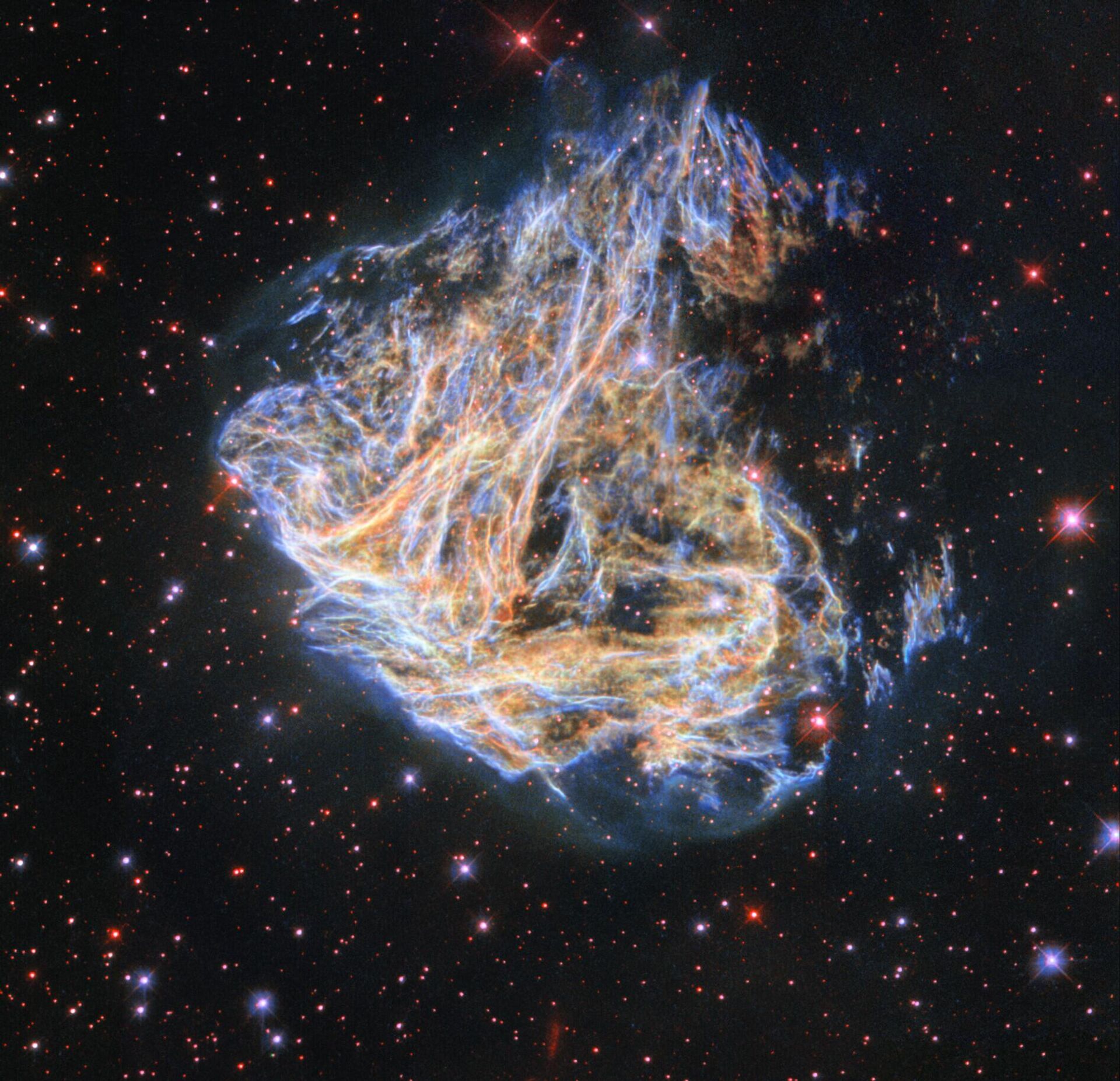 O Telescópio Espacial Hubble da NASA registrou os fragmentos da remanescente de supernova colorida DEM L 190 - Sputnik Brasil, 1920, 28.11.2022