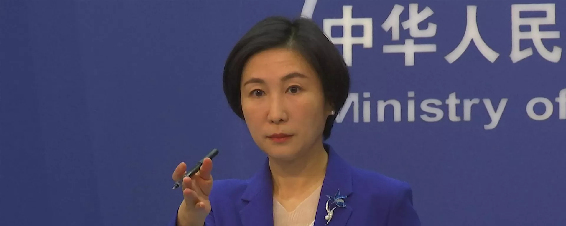 A porta-voz do Ministério das Relações Exteriores da China Mao Ning durante coletiva de imprensa em Pequim, em 13 de outubro de 2022 - Sputnik Brasil, 1920, 25.02.2026