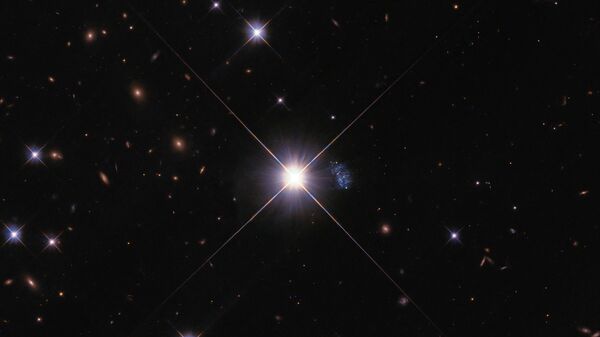 Encoberta pela estrela TYC 7215-199-1, a galáxia anã, denominada Peekaboo, ficou escondida durante décadas - Sputnik Brasil